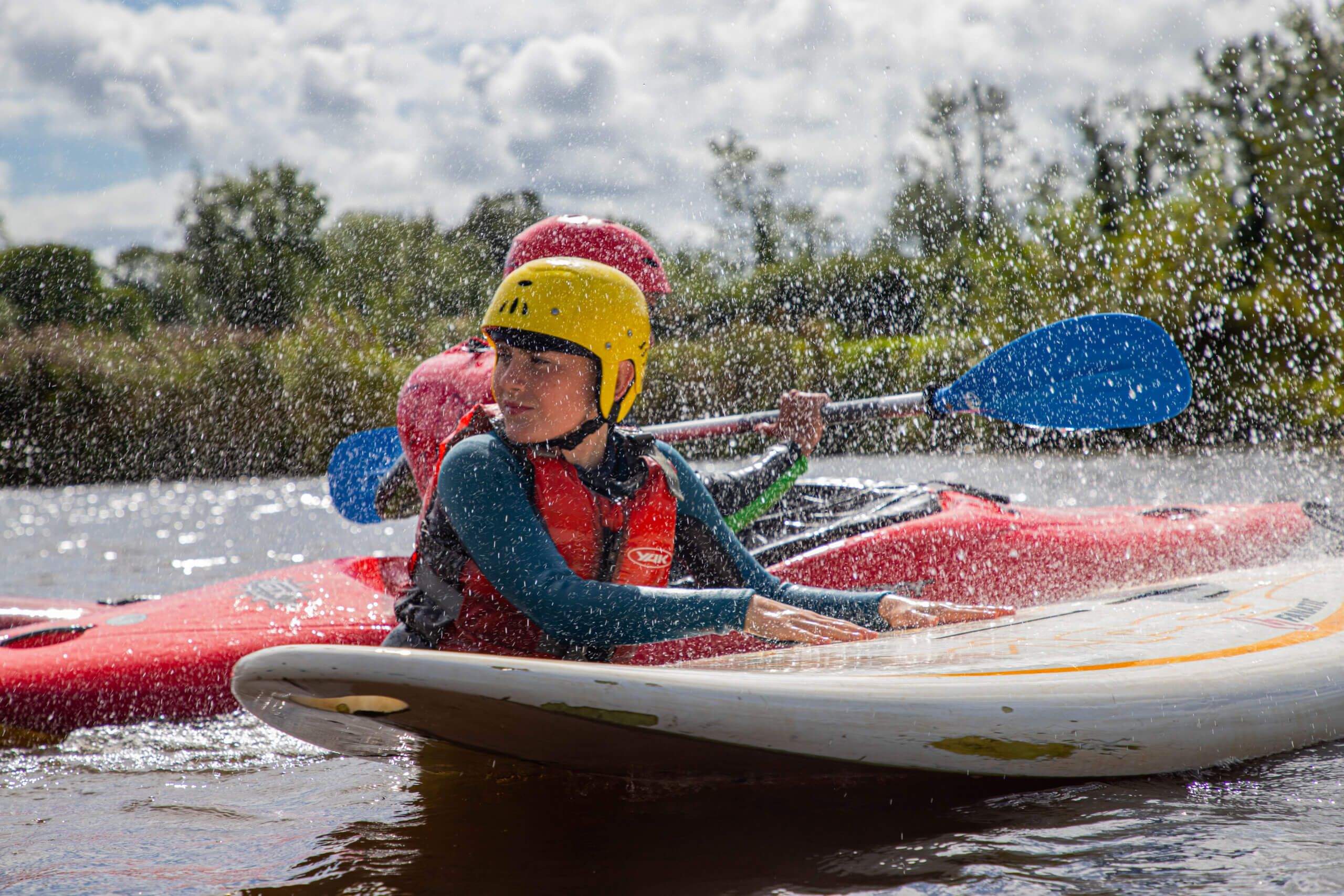 Kid with SUP board in Rooskey